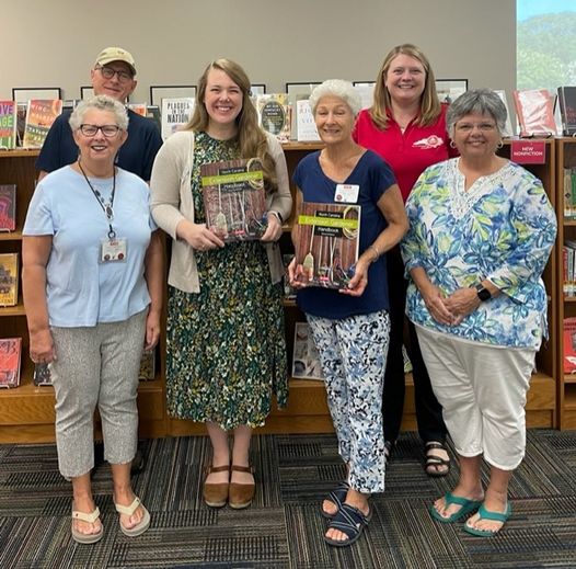 Extension Master Gardener Volunteers donate hardcopies of NC Extension Gardener Handbooks to Wayne County Public Library.